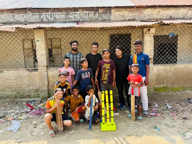 Volunteers playing with village children